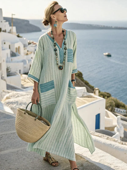 Vestido Maxi Estampado – Escote en V y Bolsillos