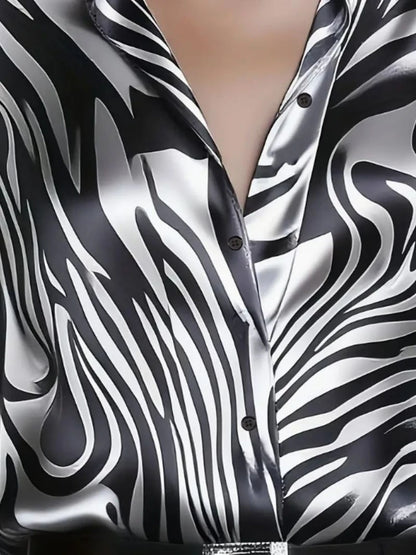 Blusa Elegante Satinada con Estampado Abstracto y Manga Larga