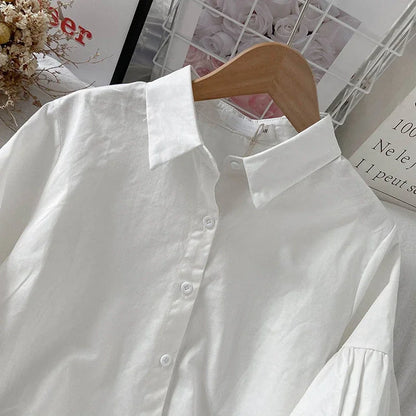 Blusa Blanca con Mangas Abullonada