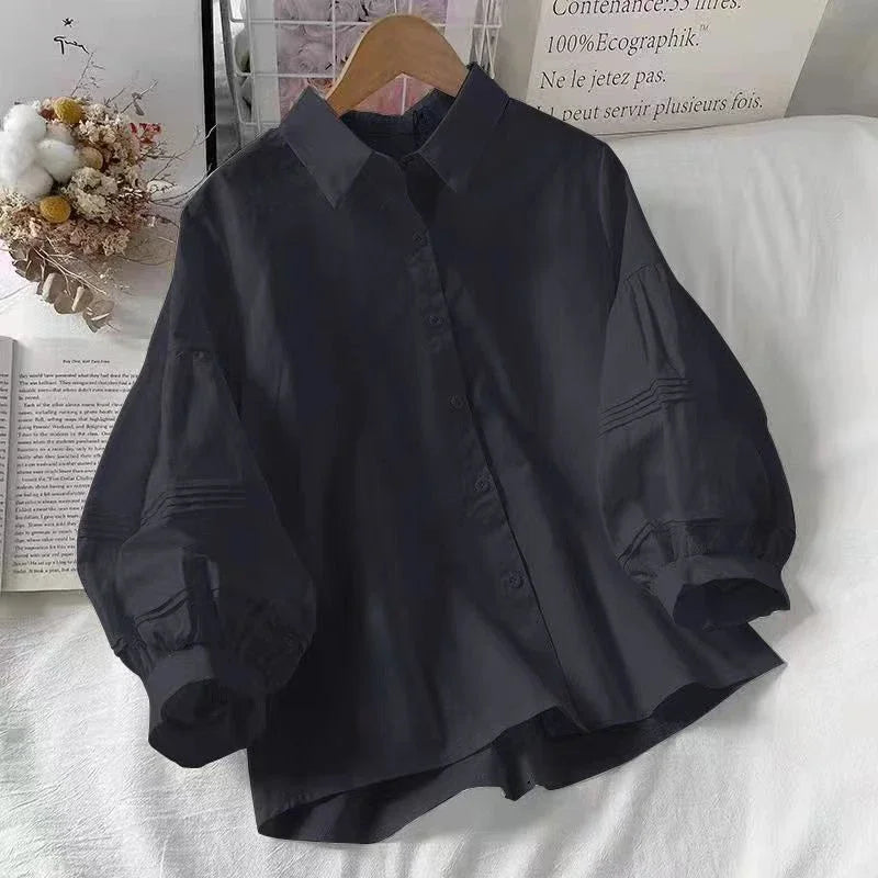 Blusa Blanca con Mangas Abullonada