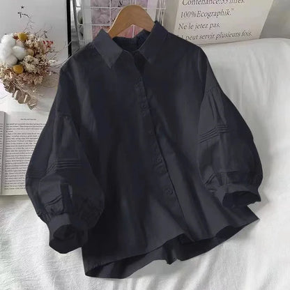 Blusa Blanca con Mangas Abullonada