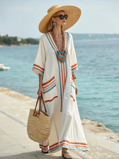 Vestido Maxi Estampado – Escote en V y Bolsillos