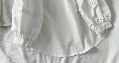 Blusa Blanca con Mangas Abullonada